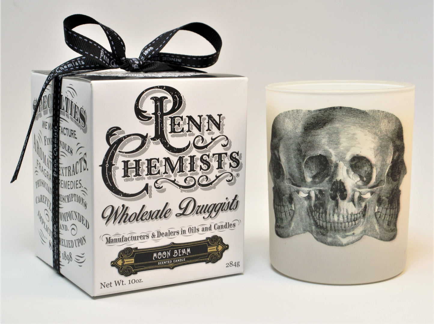 "TRI-SKULL" in MOON BEAM 10 OZ LIMITED EDITION CANDLE